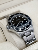 2004 Rolex Submariner 40mm 14060M Stainless Steel Two-Liner Black Dial